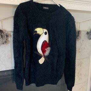 NWOT Black Fuzzy Toucan Sam Sweater Size M/L